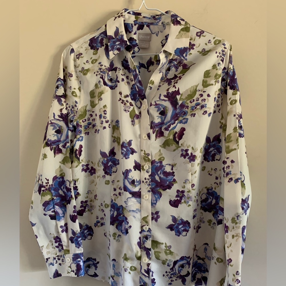 Chico’s long sleeved blouse. Pretty blue flowered print. Size 1.